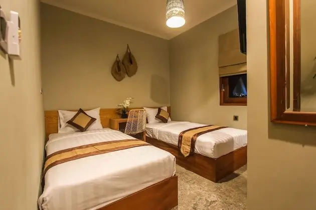 Deluxe Tek Büyük veya İki Ayrı Yataklı Oda