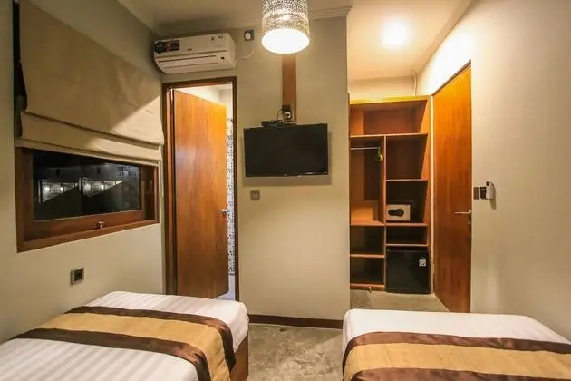 Deluxe Tek Büyük veya İki Ayrı Yataklı Oda