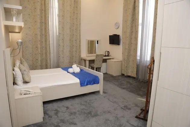 Deluxe Tek Büyük veya İki Ayrı Yataklı Oda