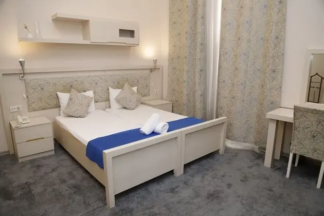 Deluxe Tek Büyük veya İki Ayrı Yataklı Oda
