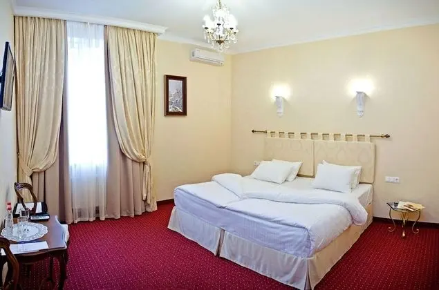 Comfort Tek Büyük veya İki Ayrı Yataklı Oda
