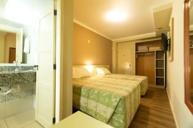 Quarto triplo executivo