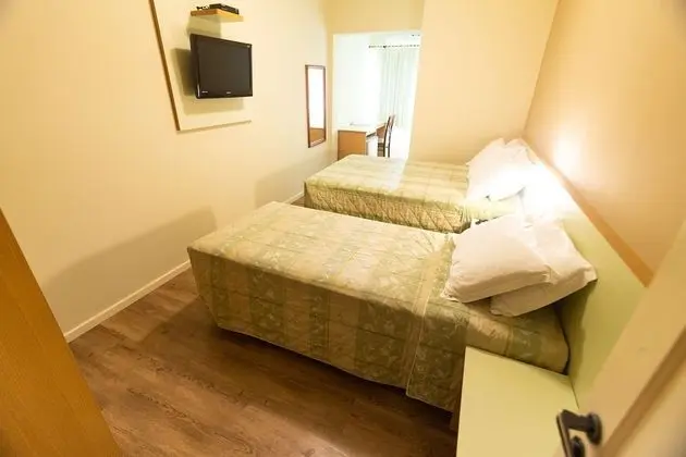 Quarto triplo executivo