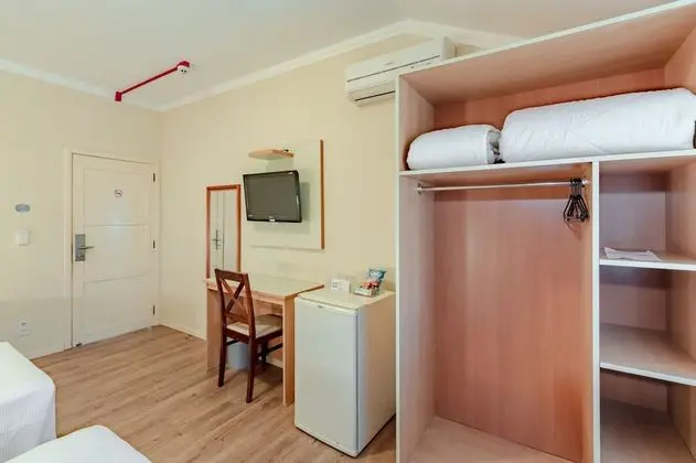 Quarto triplo executivo