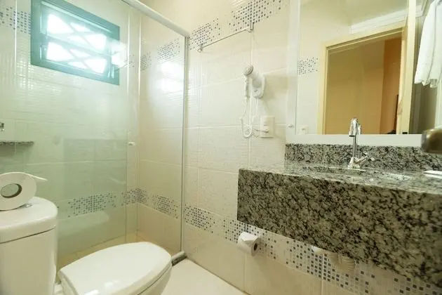 Quarto triplo executivo