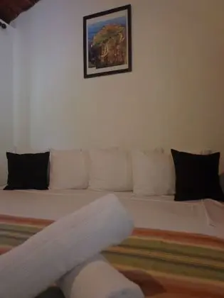 Deluxe Tek Büyük Yataklı Oda, Balkon, Bahçe Manzaralı
