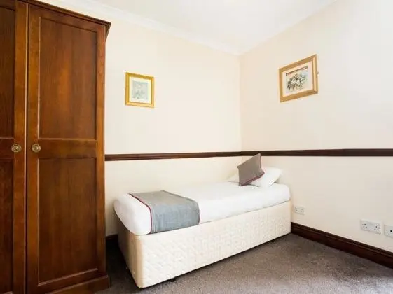 Deluxe Üç Kişilik Oda, Banyolu/Duşlu