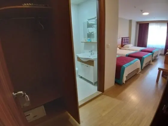 Üç Kişilik Oda