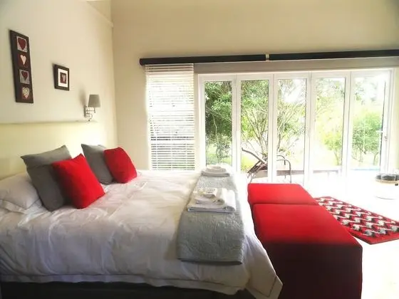 Boutique Red Ivory Sleeps 2