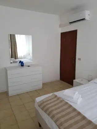 Deluxe Tek Büyük veya İki Ayrı Yataklı Oda
