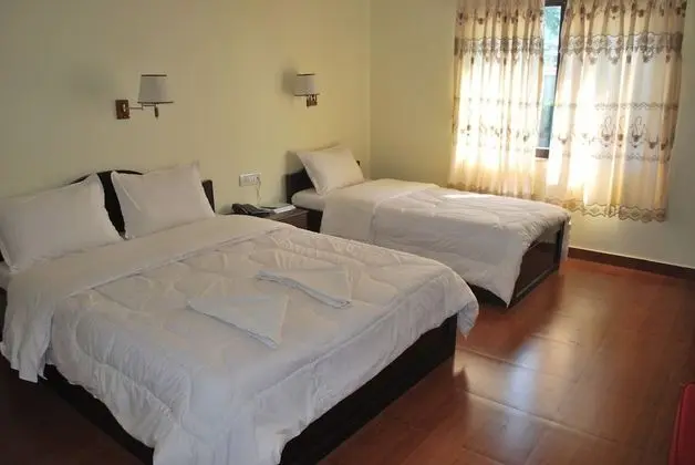 Deluxe Tek Büyük veya İki Ayrı Yataklı Oda (with Fan)