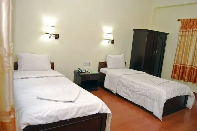 Deluxe Tek Büyük veya İki Ayrı Yataklı Oda (with Fan)