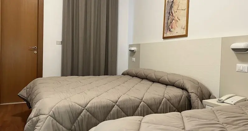 Üç Kişilik Oda