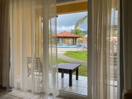 Quarto Luxo Vista Piscina ou Parcial Mar