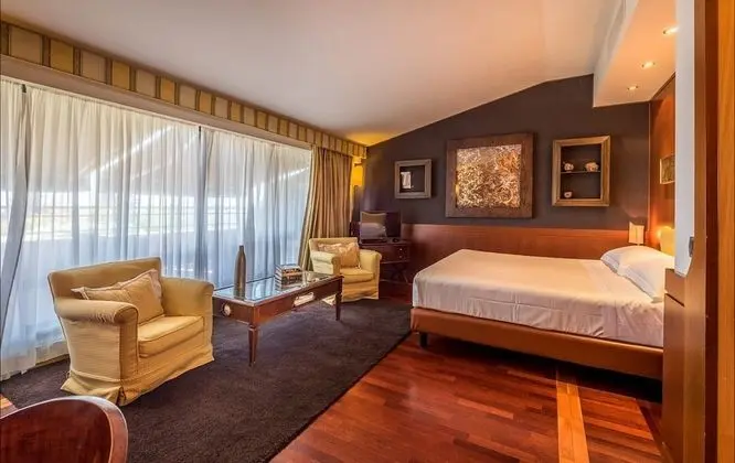 Deluxe Tek Büyük veya İki Ayrı Yataklı Oda