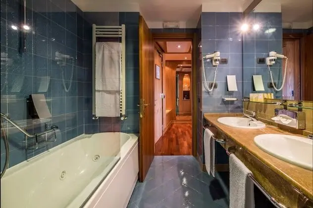 Deluxe Tek Büyük veya İki Ayrı Yataklı Oda