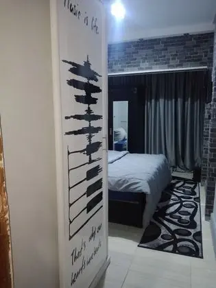 City Tek Büyük Yataklı Oda
