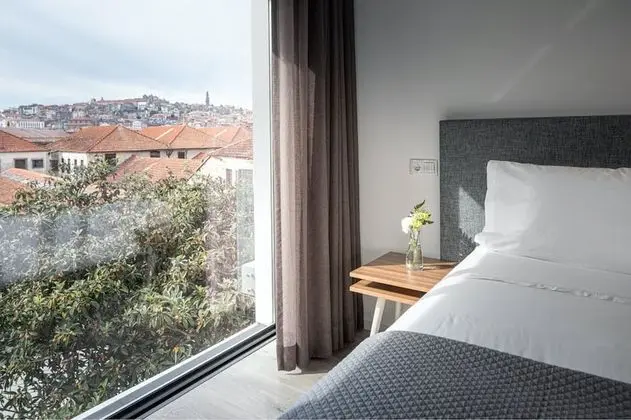 Tek Büyük veya İki Ayrı Yataklı Oda (Porto)