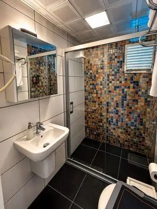 Comfort Üç Kişilik Oda, Deniz veya Kara Manzaralı, Balkonlu