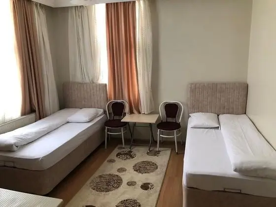 Üç Kişilik Oda