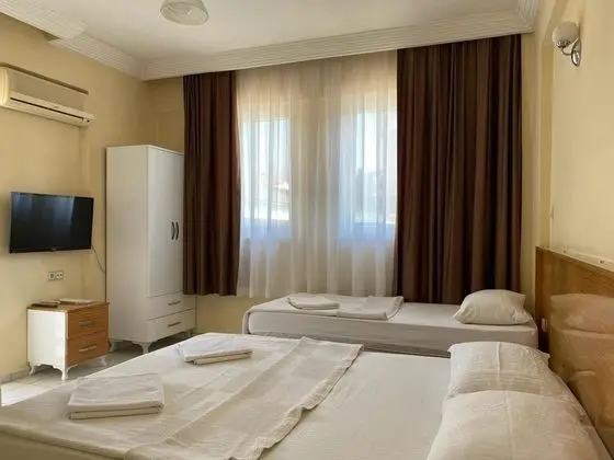 Standart Üç Kişilik Oda, Bahçe Manzaralı
