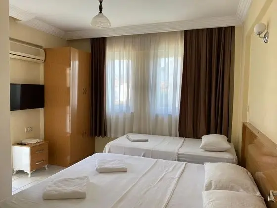 Standart Üç Kişilik Oda, Bahçe Manzaralı