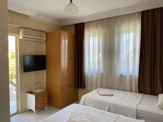 Standart Üç Kişilik Oda, Bahçe Manzaralı