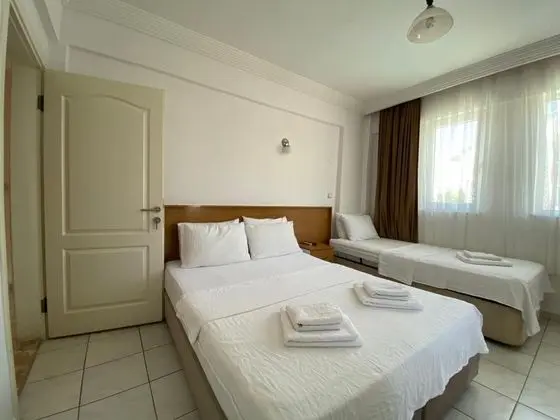 Standart Üç Kişilik Oda, Bahçe Manzaralı