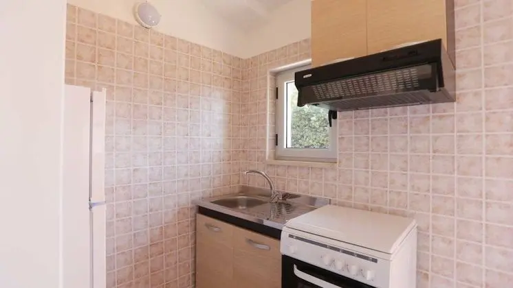 Basic Bungalov, 1 Büyük (Queen) Boy Yatak