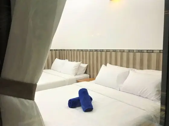 Standard Dört Kişilik Oda, Bahçe Manzaralı