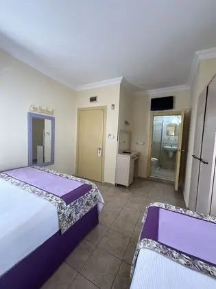 Üç Kişilik Oda