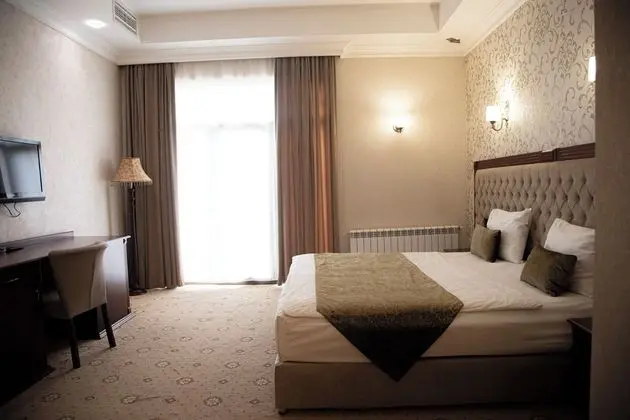 Deluxe Tek Büyük veya İki Ayrı Yataklı Oda