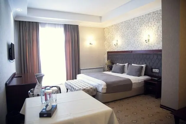 Deluxe Tek Büyük veya İki Ayrı Yataklı Oda