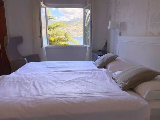 Basic Tek Büyük veya İki Ayrı Yataklı Oda