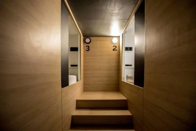 Capsule with Shared Bathroom