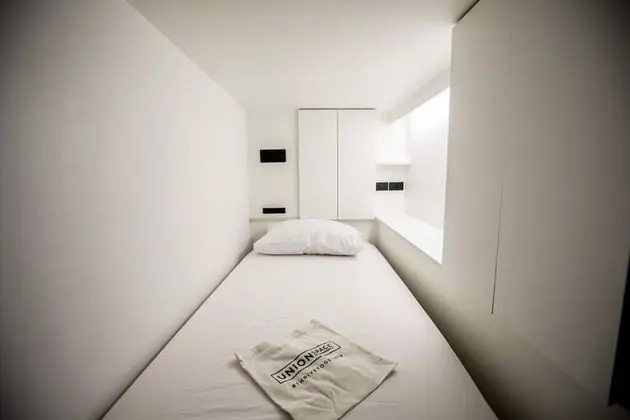 Capsule with Shared Bathroom