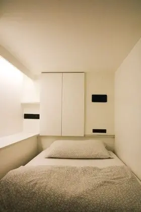 Capsule with Shared Bathroom
