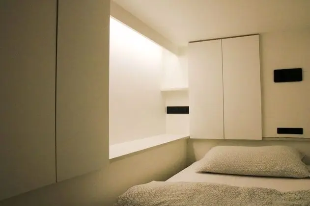 Capsule with Shared Bathroom
