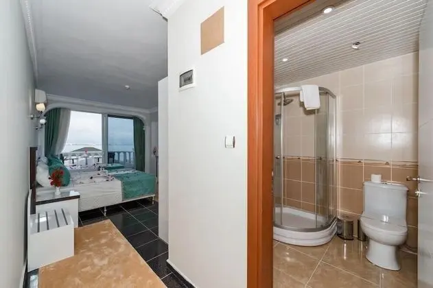 Deluxe Büyük Yataklı Tek Kişilik Oda, 1 Çift Kişilik Yatak, Deniz Manzaralı, Denize Bakan