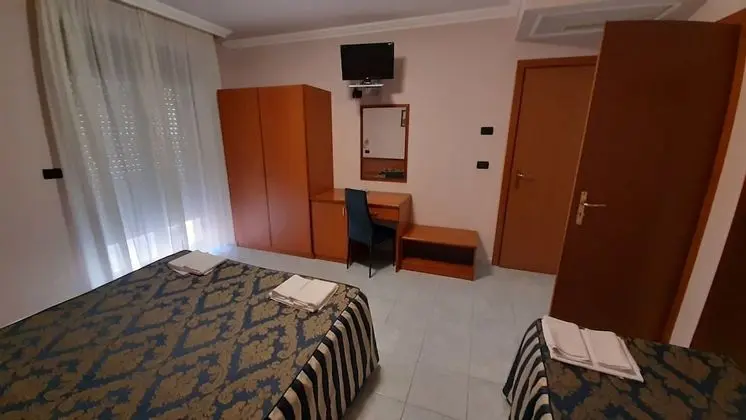Üç Kişilik Oda