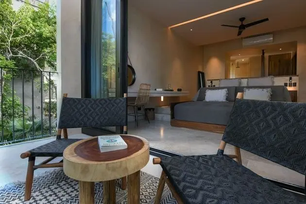 Luxury Suite with King Bed Balcony and Garden View