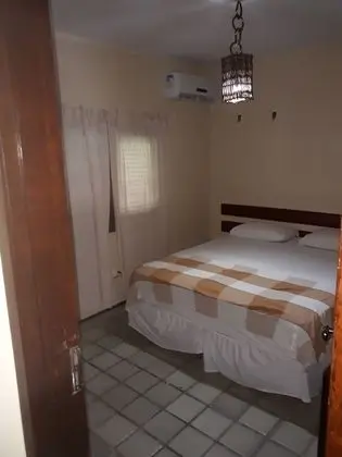 Quarto triplo básico com  ar condicionado