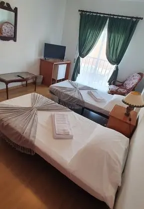 Basic Tek Büyük veya İki Ayrı Yataklı Oda