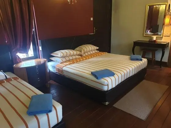 Deluxe Üç Kişilik Oda, Bahçe Manzaralı