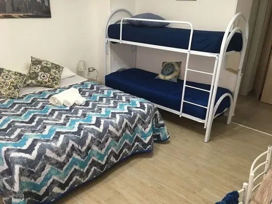 Deluxe Dört Kişilik Oda