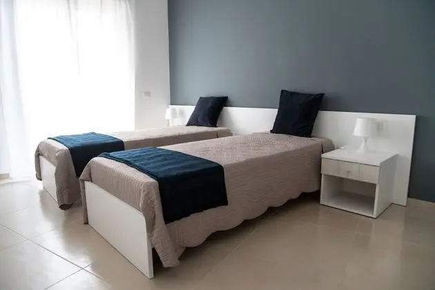 Tek Büyük veya İki Ayrı Yataklı Oda, Ortak Banyo