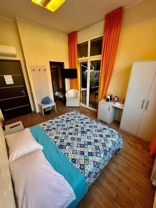 Basic Tek Büyük veya İki Ayrı Yataklı Oda