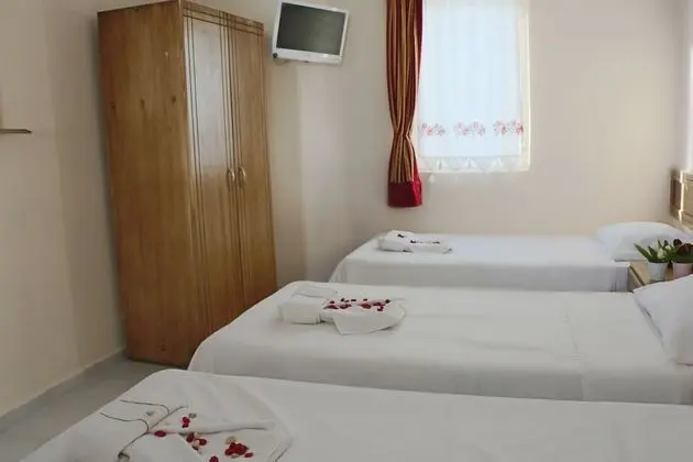 Üç Kişilik Oda