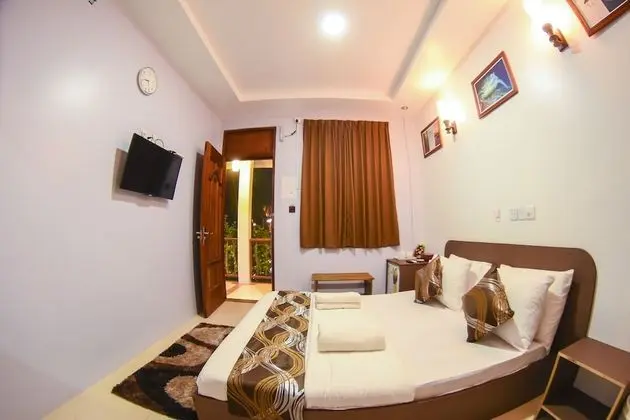 Deluxe Tek Büyük veya İki Ayrı Yataklı Oda, Özel Banyo, Plaj Manzaralı