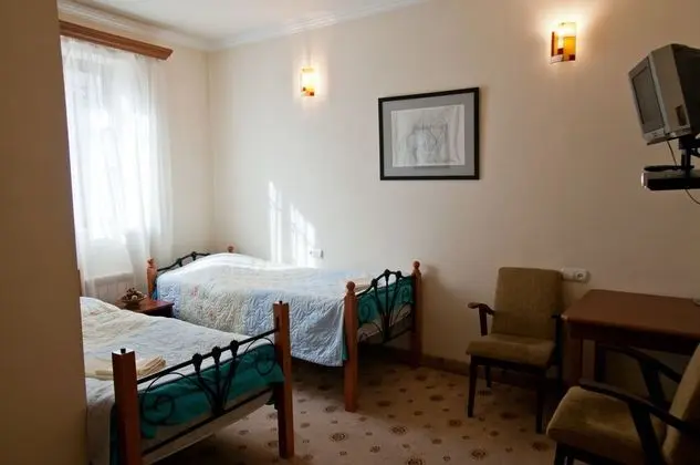 Comfort Tek Büyük veya İki Ayrı Yataklı Oda